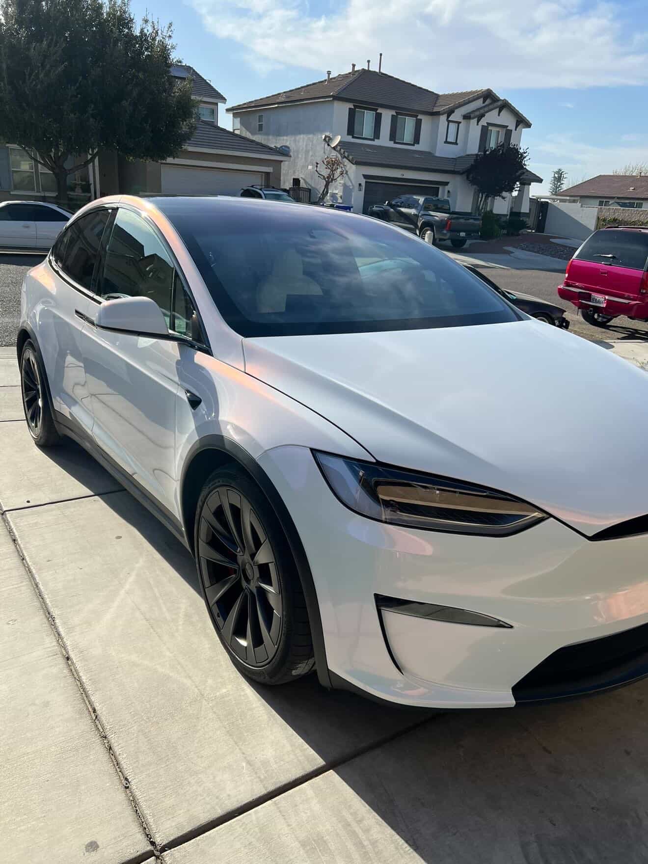 White Tesla Model X with clean styling